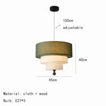 suspension lumineuse moderne trois abat jours tissu vert olive classique
