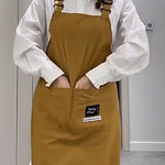tablier cuisine marron vertolive rouge uni moderne fonctionnel boucles pocheavant étiquette logossering