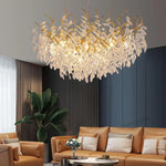 Suspension lumineuse contemporaine transparente dorée branches feuilles LED 100cm
