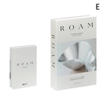 décoration intérieure livres faux blanc gris moderne minimaliste feuilles table étagère