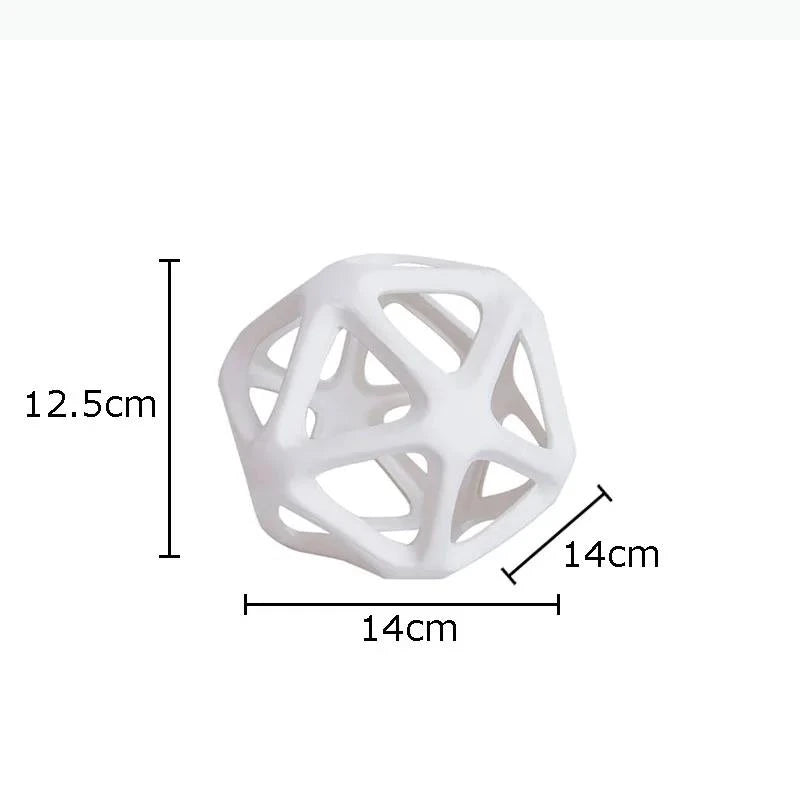 décoration intérieure moderne sculpture sphérique géométrique blanc noir doré structure ouverte