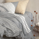 drap housse couette taies d'oreiller literie lin texturé beige taupe minimaliste naturel