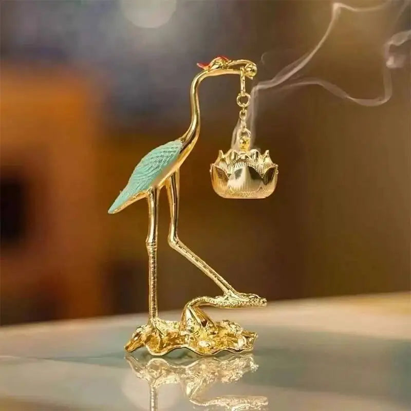 statuette oiseau or noir bleu artisanal élégant décoration maison motif floral support métal
