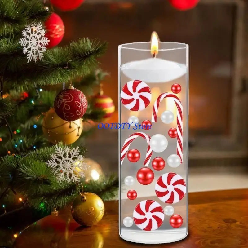 bougies flottantes noel transparentes cannes sucre boules rouges vertes blanches