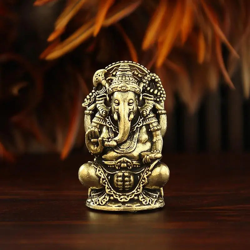 statues ganesha bronze doré détails sculptés traditionnelles indiennes ornement maison