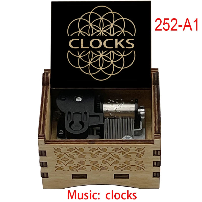 boîte musicale bois naturel motifs floraux 18 tons vintage manivelle horlogerie artisanale