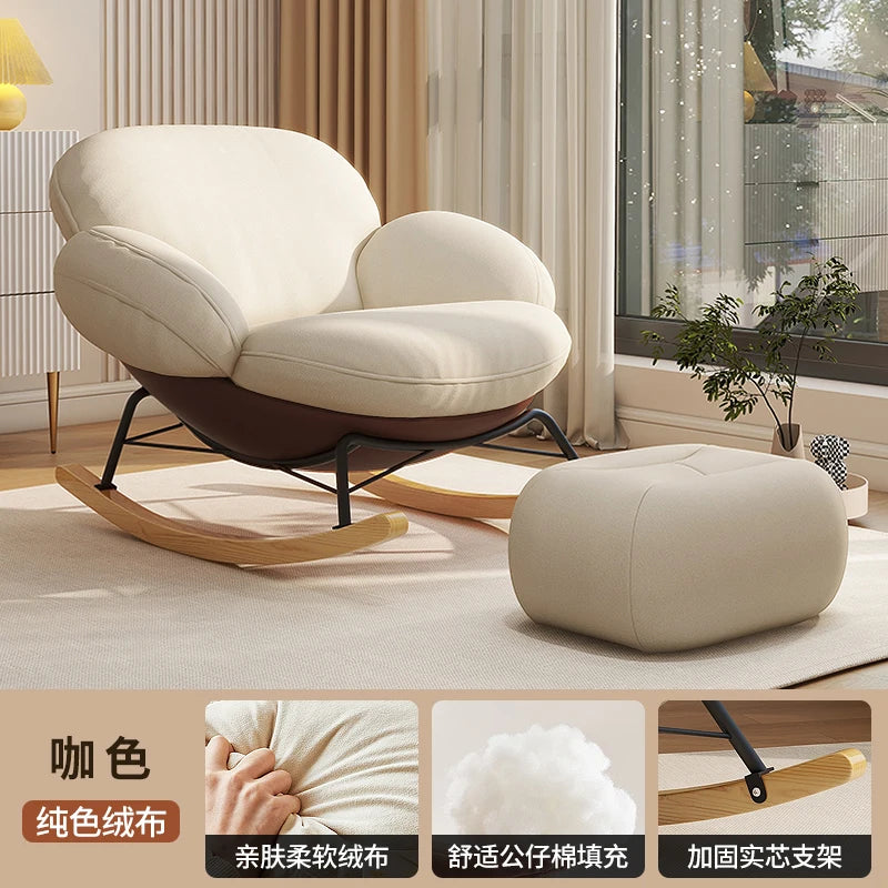 fauteuil bascule moderne beige noir orange roulettes coussin repos minimaliste salon