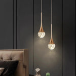 lampe suspendue moderne or noir cristal bulle brillant transparent chambre salon étude