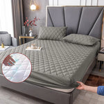 protège matelas imperméable bleu clair gris blanc quilté moderne maison