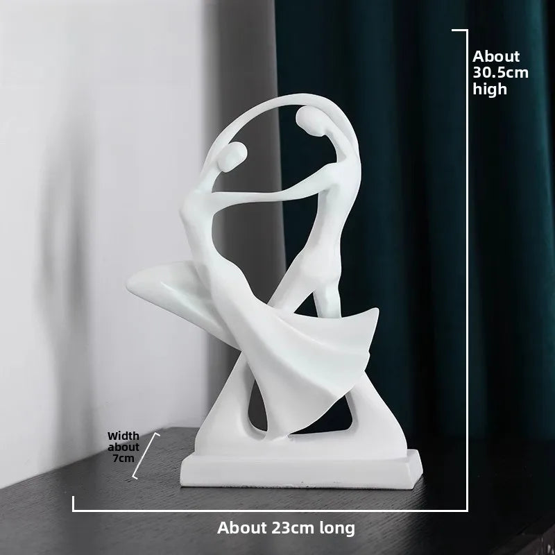 figurines humaines enlacées noir blanc sculpture résine moderne minimaliste