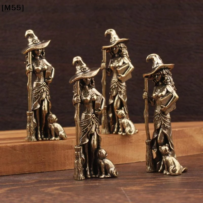 statuette sorcier bronze doré détails métalliques artisanal rétro chapeau pointu balai chat robe décoration