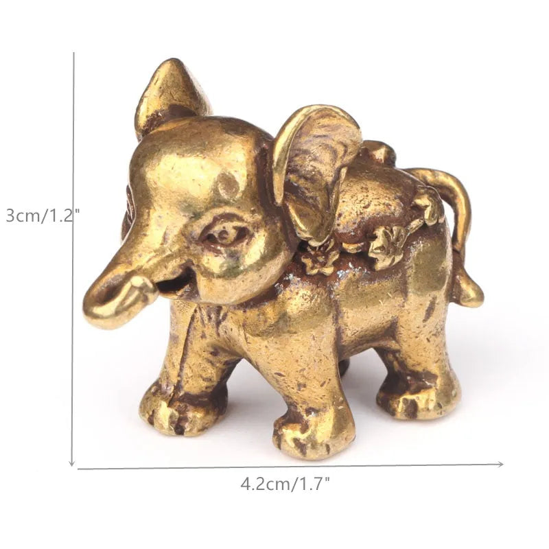 statuette éléphant bronze doré texture peau éléphant motifs floraux traditionnel asiatique décoration maison salon