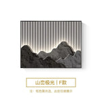 cadre mural contemporain noir montagne relief lignes lumineuses minimaliste fixations murales decoration interieur