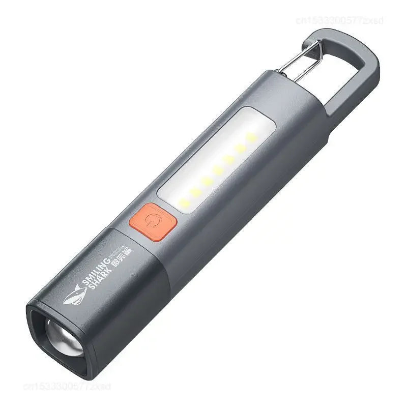 lampe torche rechargeable lumiere intense gris orange moderne anneau fixation interrupteur led