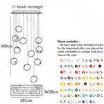 lampes suspendues modernes sphères colorées brillantes intensité variable transparentes opaques chambre salon