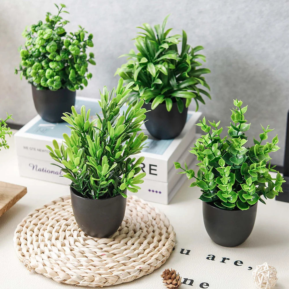 décoration intérieure plantes artificielles pots noirs feuilles vertes minimalisteintérieur maison