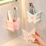 rangement mural papillon rose blanche brosses dents pinceaux maquillage deco girly fantaisiste