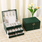 boîte bijoux cuir noir velours intérieur rangements classique poignées dorées bijoux organisation sécurité multifonctionnelle
