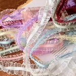rubans franges polyester couleur noir rose vert bleu beige blanc translucides décoration party accessoires