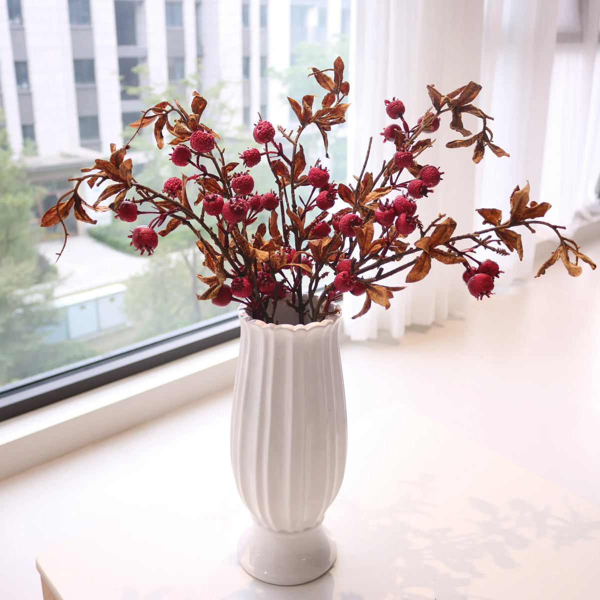 décoration intérieure bouquet artificiel feuilles baies rouge orange naturel rustique