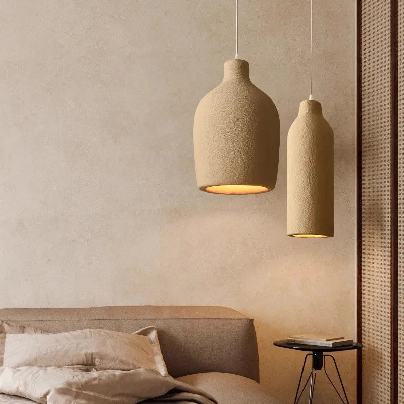 suspension lumineuse pendentif résine beige clair texture granuleuse moderne salon chambre principal