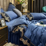 ensemble literie complet couvre lit bleu marine broderie dorée drap taies oreiller classique