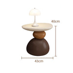 table basse ronde pierre moderne minimaliste sculptural couleur vive salon