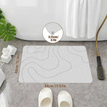 tapis bain moderne 60x40cm gris foncé vert blanc motifs ondulés relief absorbant