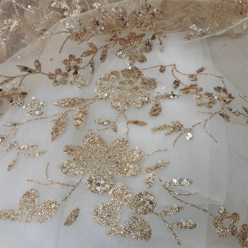 tissu dentelle fleurs feuilles sequins blanc doré translucide élégant festif décoratif robes costumes