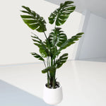 plantes artificielles vertes feuilles grandes moderne pot support métallique exposition extérieure