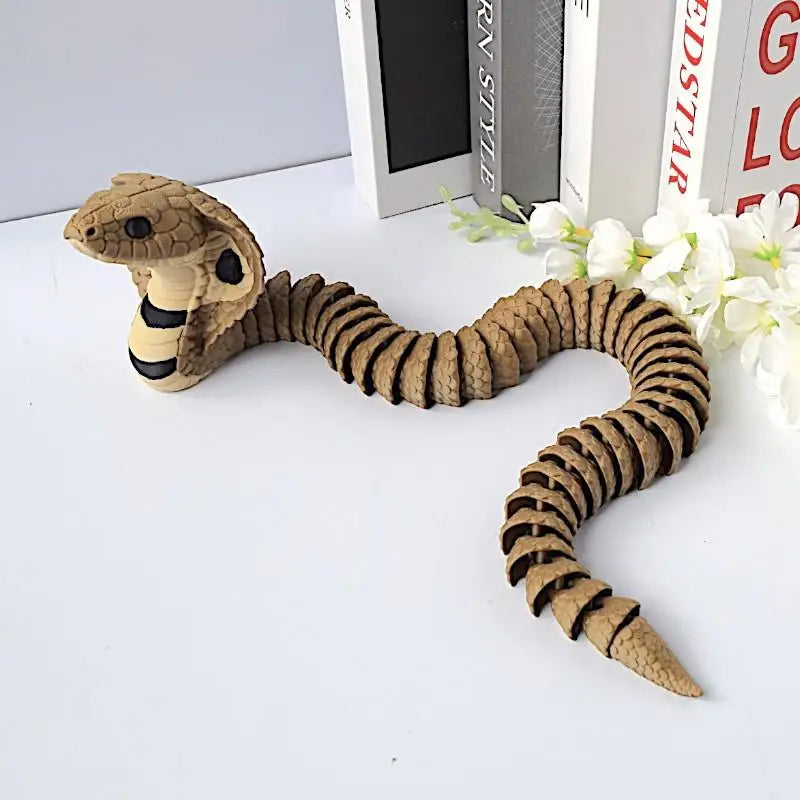 jouet serpent articulé marron noir réelle 33cm décoratif imitations écailles texturées éléments fleurs livres