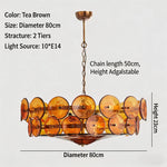 suspension lumineuse moderne élégante verre orange rond translucide chaîne métallique