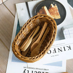 paniers rangement rotin tressé marron clair traditionnels réutilisables fourchettes bois décoration maison multifonctionnels