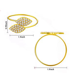 Bague en or 18 carats ornée de cristaux scintillants en forme de feuilles.