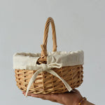 panier rotin tressé traditionnel beige clair poignée ruban blanc stockage rangement utilisation multipleDecorationFleurs
