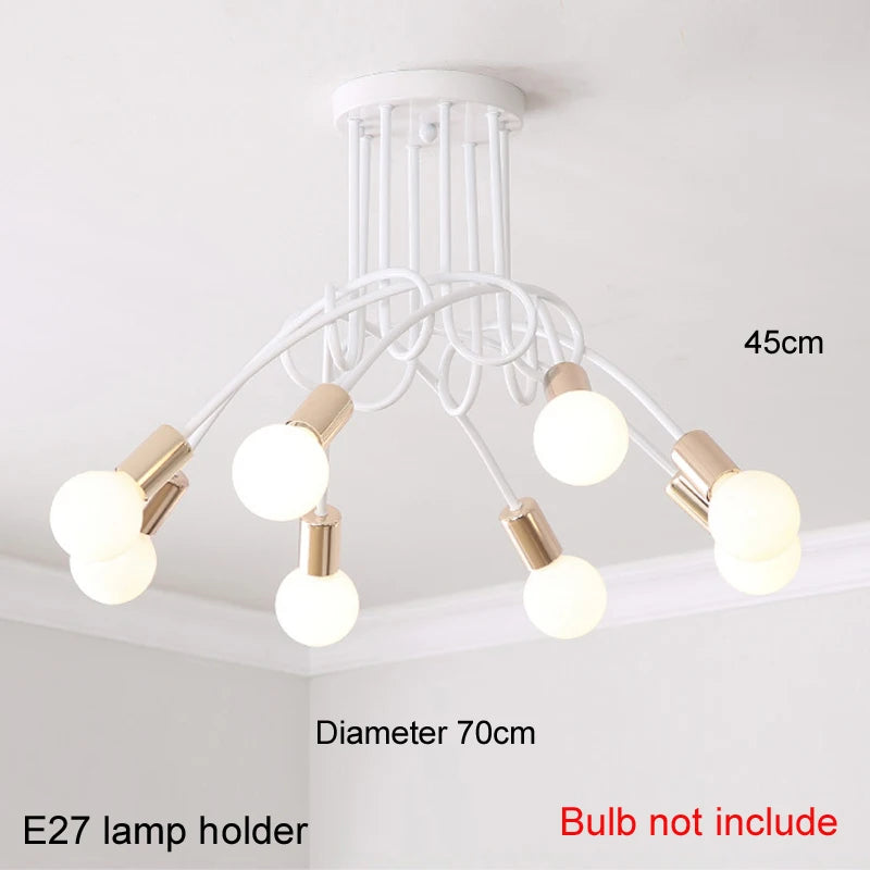 suspension lumineuse moderne noir doré ampoules blanches structure spirale fixation câbles métallique
