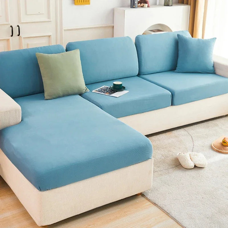housses canapé vert clair rayures horizontales moderne adhésif coussins décoratifs tapis bleu clair blanc