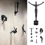 statues escalade homme résine noires texture rugueuse détail anatomique réaliste fixées
