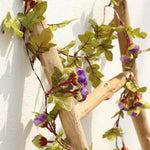 guirlande lumineuse fleurs artificielles rose rouge vert feuilles texturées décoration romantique autoinstallation batterie led