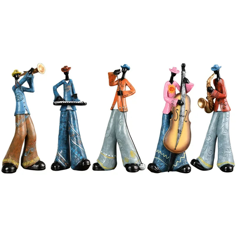 statues musiciens résine trompette saxophone chanteur clavier violoncelle ethnique artisanal décoration maison salon