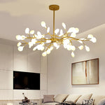 suspension lumineuse or blanc feuilles stylisées opalescente contemporaine 18 ampoules