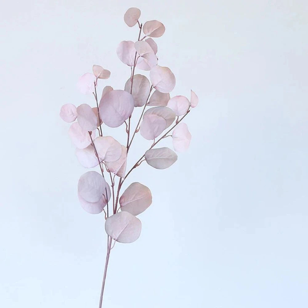 bouquet artificiel feuilles ovales moderne vase transparent support doré couleurs vives exposition intérieure