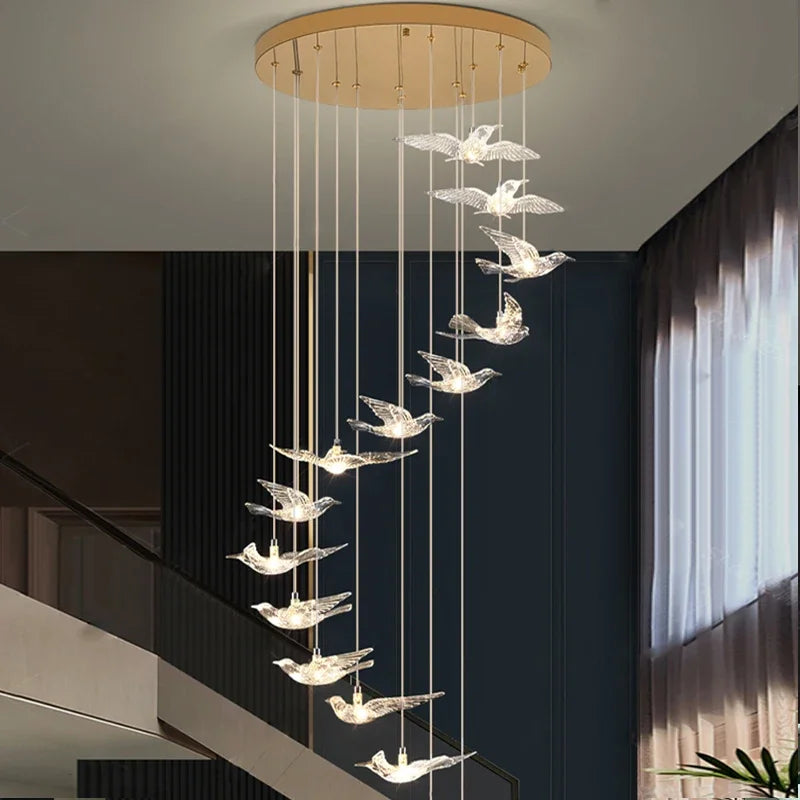 suspension lumineuse oiseaux transparente moderne contemporain lumière blanche salle manger chambre salon