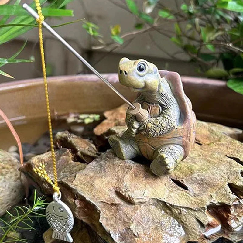 statue tortue pêche carapace hexagonale marron vert ligne jaune leurre poisson extérieur jardin decoration