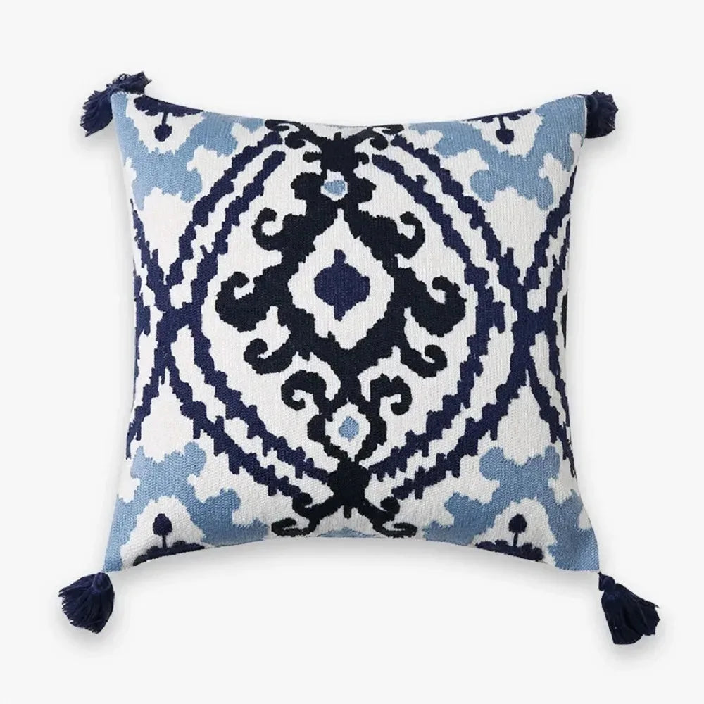 taies d'oreiller boho chic géométriques brodées couleurs vives pompons ethnique decoration intérieure respectueux environnement