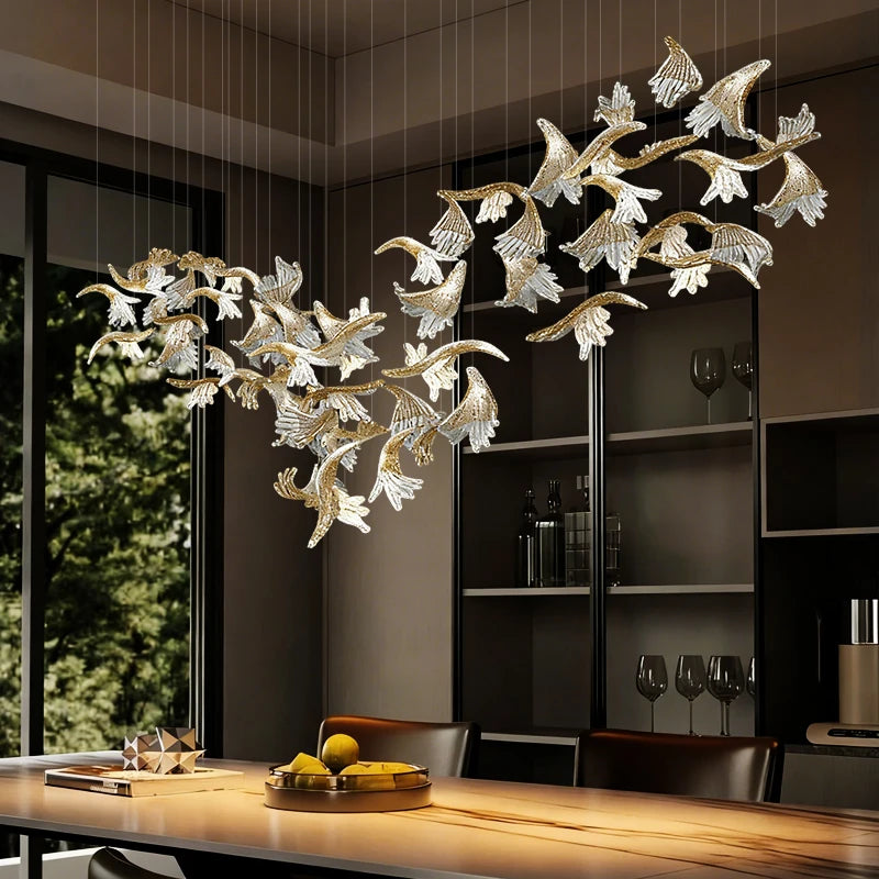 suspension lumineuse moderne élégante dorée feuilles stylisées transparente 120cm 170cm 200cm lumière chaude 3000k