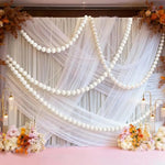 décoration mariage guirlande blanches roses poudrés vertes festive
