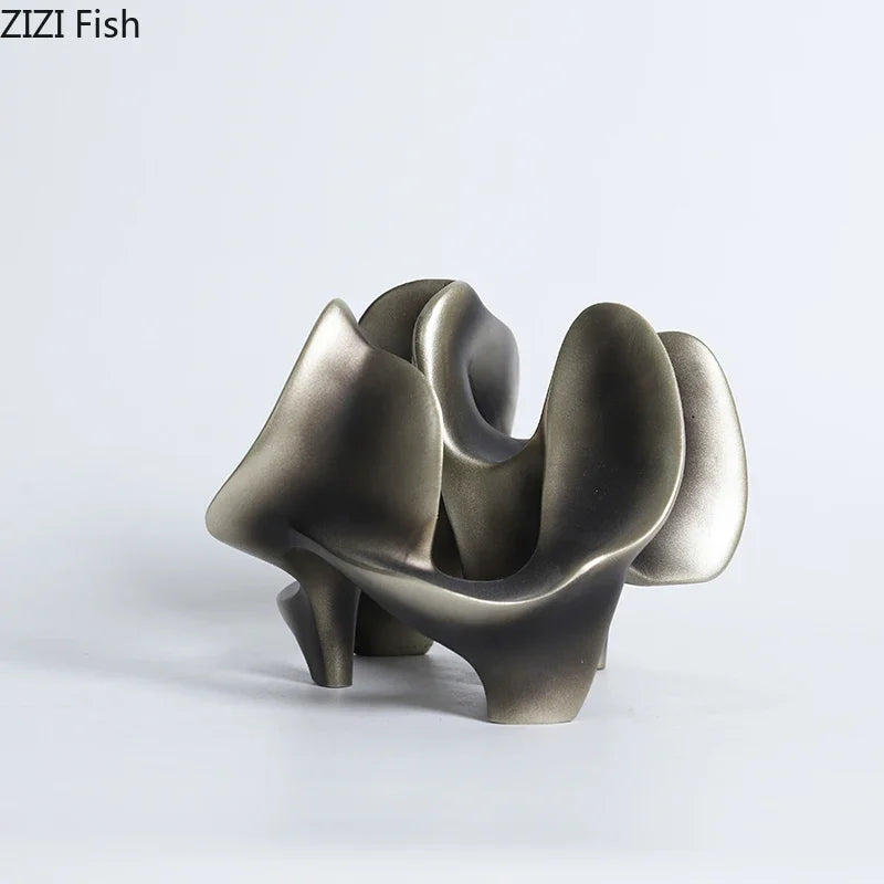 décoration moderne sculpture abstraite résine gris foncé bronze formes organiques surface lisse
