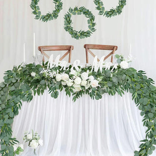 guirlandes artificielles eucalyptus saule fleurs blanches decoration mariage event vert rustic