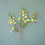 décoration intérieure fleurs artificielles soie rose blanc jaune vert branches feuilles vases transparents printemps